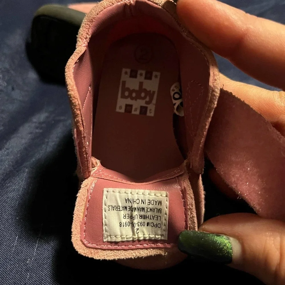 Adorable pink suede baby shoes